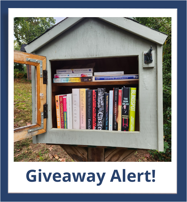 Image of my neighborhood Little Free Library full of State of Inclusion Bookstore books.